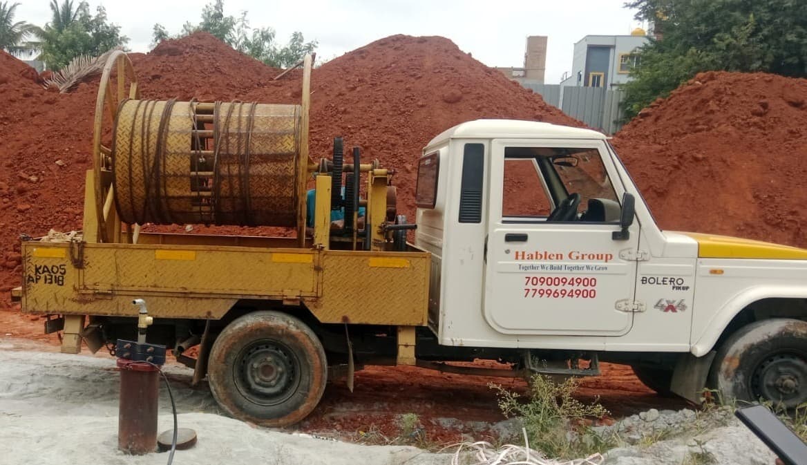 Hablen borewell installation vehicle working at a project site